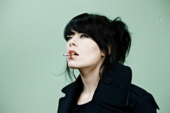 Kimbra smoking a cigarette (or weed)
